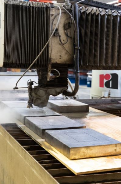 a waterjet cutter in action