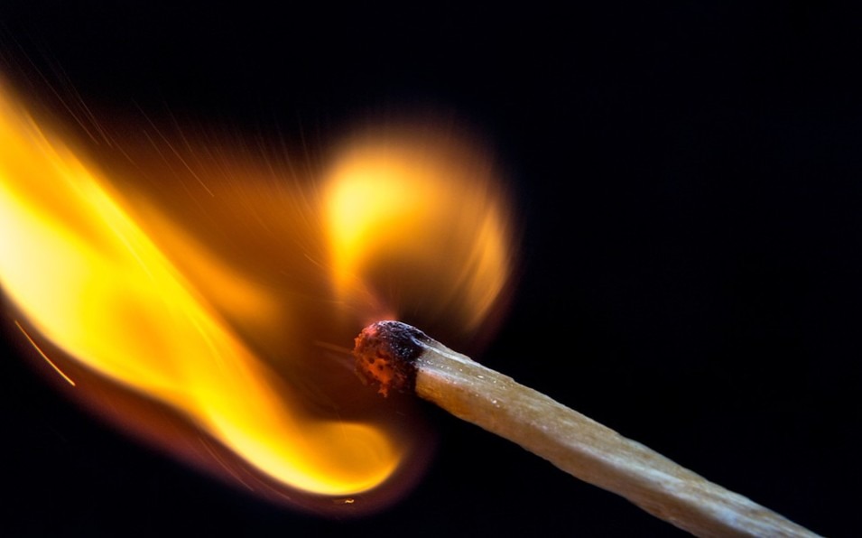 A burning matchstick