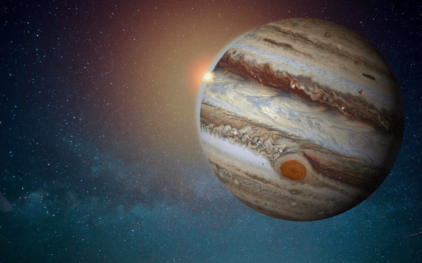 big and colorful planet, bright blue skies with stars, big red spot on Jupiter’s surface