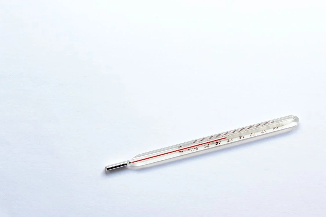 Thermometer against a white background